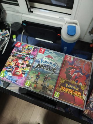 Nintendo Switch OLED + 3 juegos + accesorios