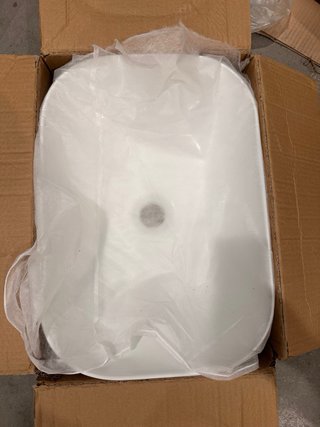 Lavabo sobre encimera ovalado de porcelana