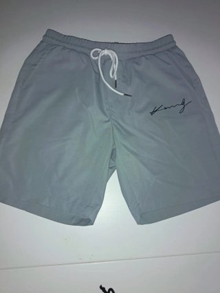 Pantalón corto gris con cordón