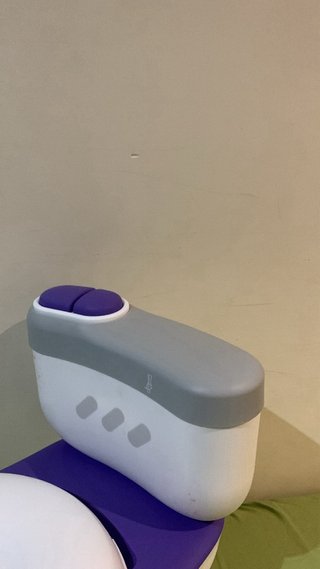 Orinal infantil morado y blanco
