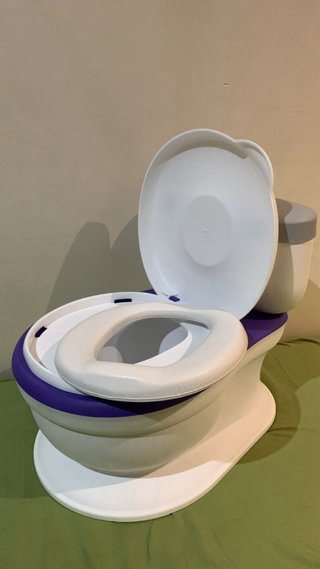 Orinal infantil morado y blanco