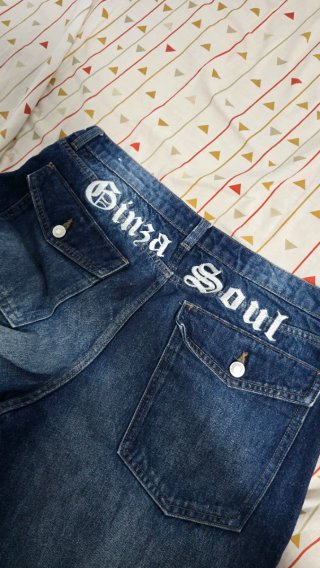 Pantalones vaqueros anchos con dragón