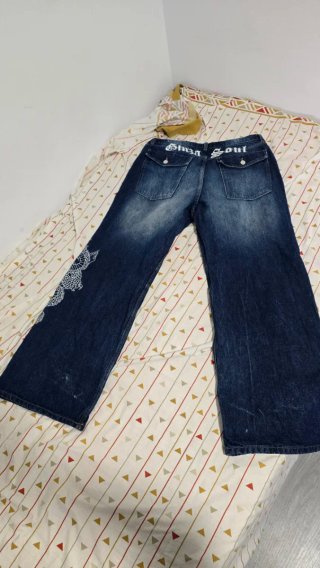 Pantalones vaqueros anchos con dragón