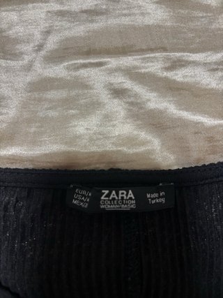 Body negro plisado manga ancha