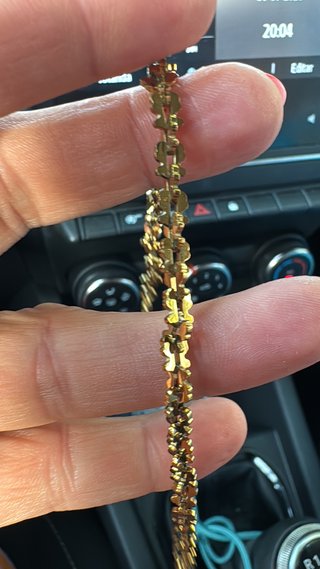 Pulsera de acero con ositos dorados