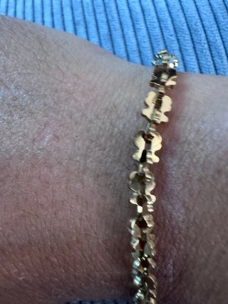 Pulsera de acero con ositos dorados