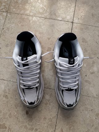 New Balance 509 Plata y Blanco