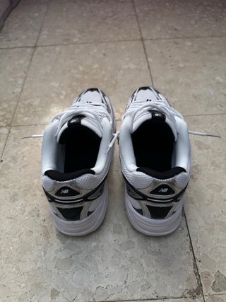 New Balance 509 Plata y Blanco
