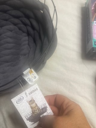 Cama para gato gris