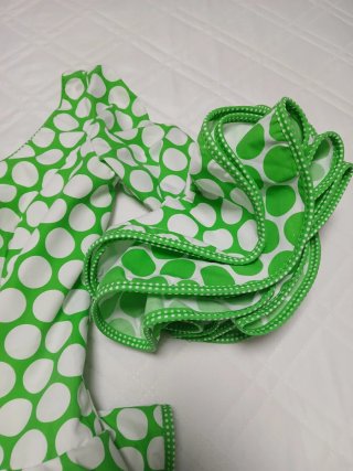 Traje corto de flamenca lunares verde y blanco.