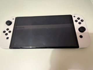 Nintendo Switch oled con accesorios