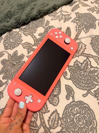 Nintendo Switch Lite Rosa + 4 Juegos