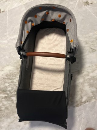 Passeggino Jane grigio con pois arancioni