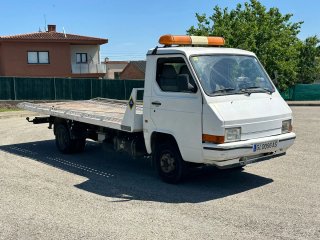 NISSAN TRADE GRUA PLATAFORMA