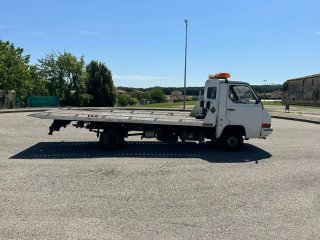 NISSAN TRADE GRUA PLATAFORMA