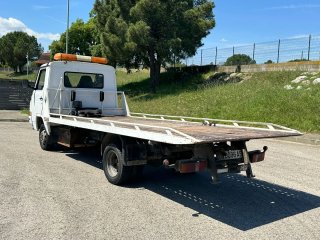 NISSAN TRADE GRUA PLATAFORMA
