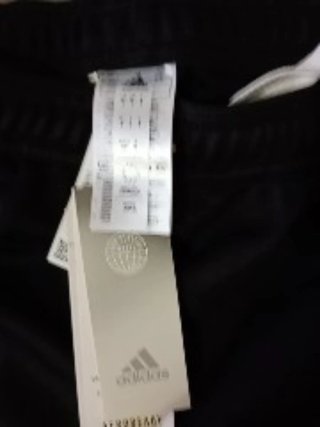 chándal Adidas negro nuevo y fino .