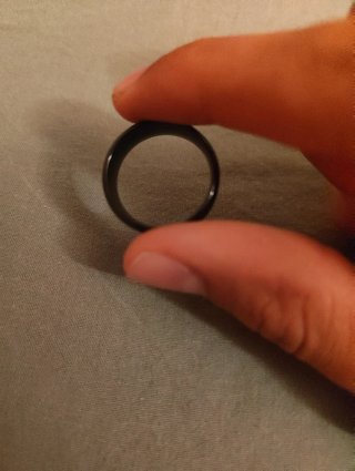 Anello nero e argento