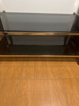 Mesa centro cristal negro y dorado