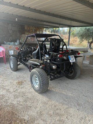 Buggy Saiting 650 todoterreno negro y rojo