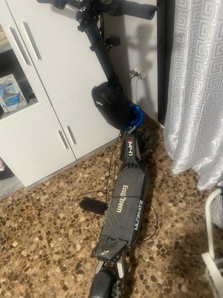 Patinete Eléctrico M41 Ultimate Negro cargador
