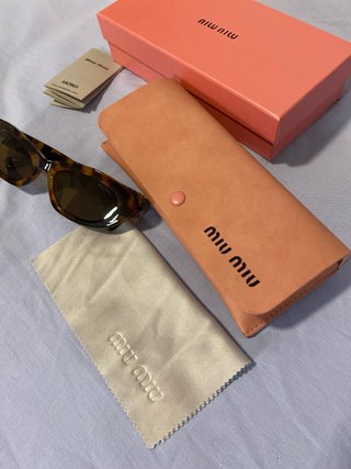 Gafas Miu Miu MU 09YS Carey
