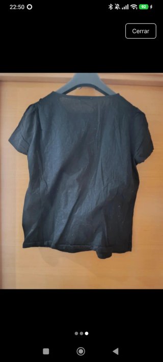 Blusa negra con volantes