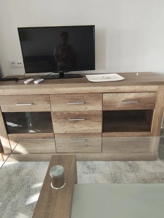 Mueble de salón madera y cristal