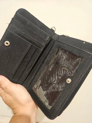 Regalo esta cartera por compra...