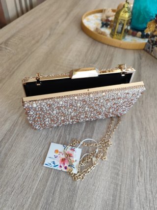 Bolso de fiesta oro rosa con pedrería