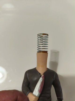 Figura Dexter Bobble Head con Cuchillo