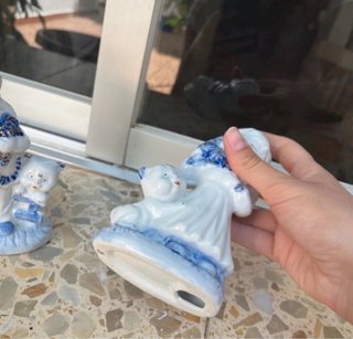 Figuras porcelana niño y niña con perros