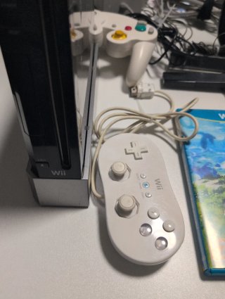Nintendo Wii U y Wii + Balance Board y Juegos