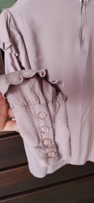 Blusa rosa con volantes