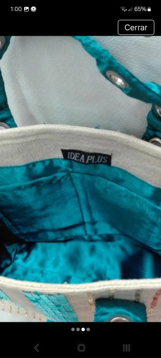 Bolso de lona con lentejuelas está forrado
