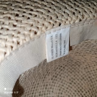 Sombrero de paja beige con flores