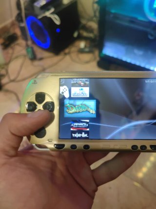 PSP 1000 Negra/Dorada + Accesorios