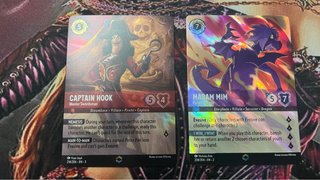 Cartas Disney Lorcana - Capitán Garfio y Madam Mim
