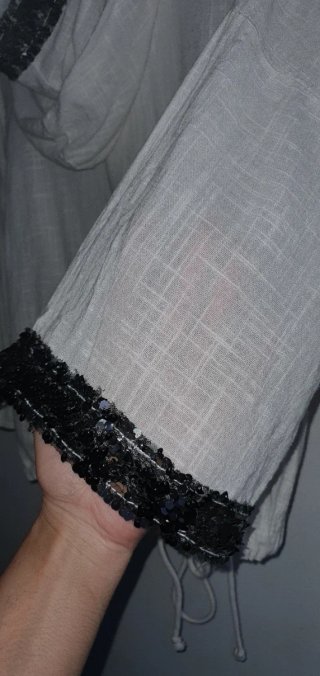 Chaquetas con lentejuelas gris/blanca
