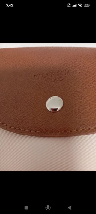 Bolso de mano beige y marrón