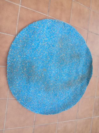 Alfombra redonda azul y multicolor