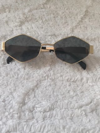 Gafas de sol hexagonales doradas