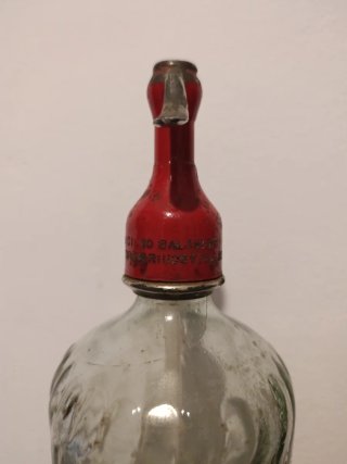 Sifón antiguo cabeza de plomo