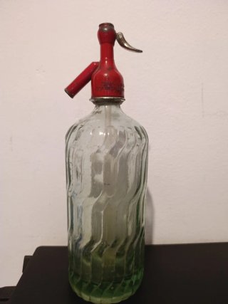 Sifón antiguo cabeza de plomo
