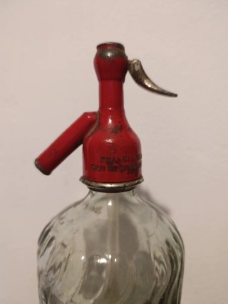 Sifón antiguo cabeza de plomo