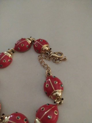 Bracciale vintage dorato con coccinelle