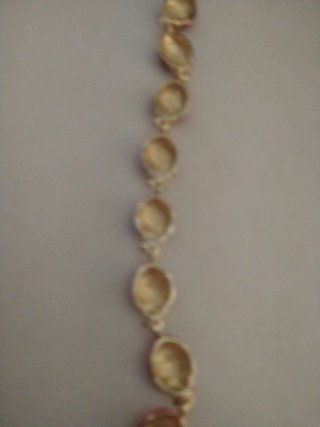 Bracciale vintage dorato con coccinelle