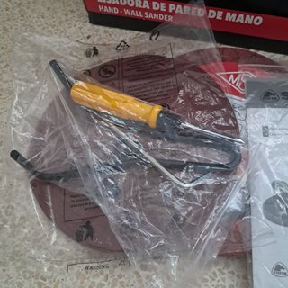 Lijadora de mano para pared