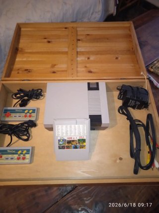 Consola Nintendo NES con mandos y juego