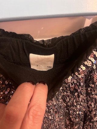 Falda niña lentejuelas plateadas talla 7